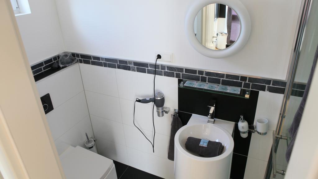 Villaci Business Apartments Лаймен Стая снимка
